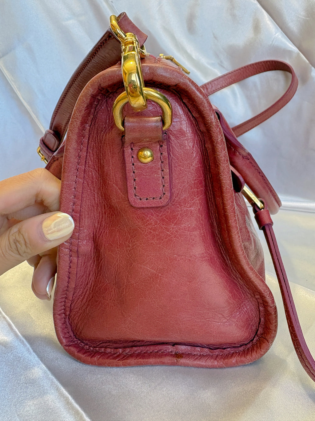 Miu Miu Vitello Lux Crossbody Bag – Red Distressed Leather Top-Handle Mini Bag with Gold Hardware